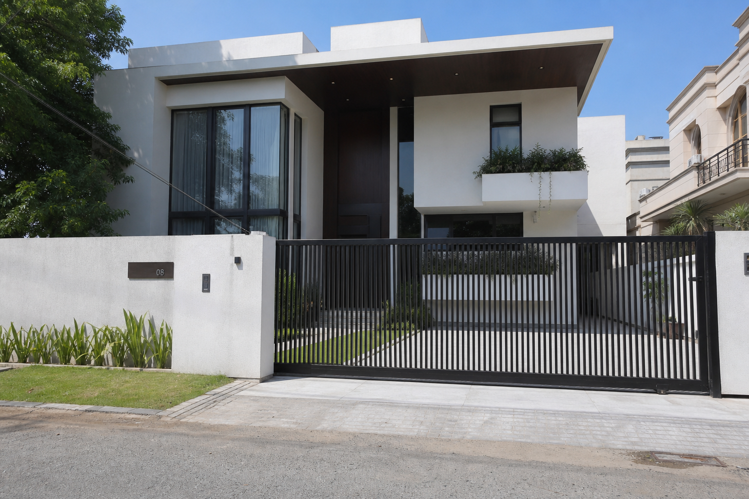 10 Marla contemporary house design with black vertical-slat gate and planter balcony, Gulberg Lahore