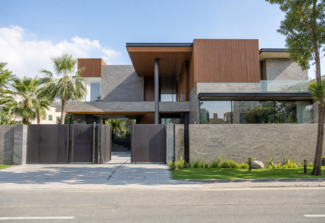 1 Kanal tropical modern house design with stone, wood and cantilevered overhang, Bahria Town Karachi